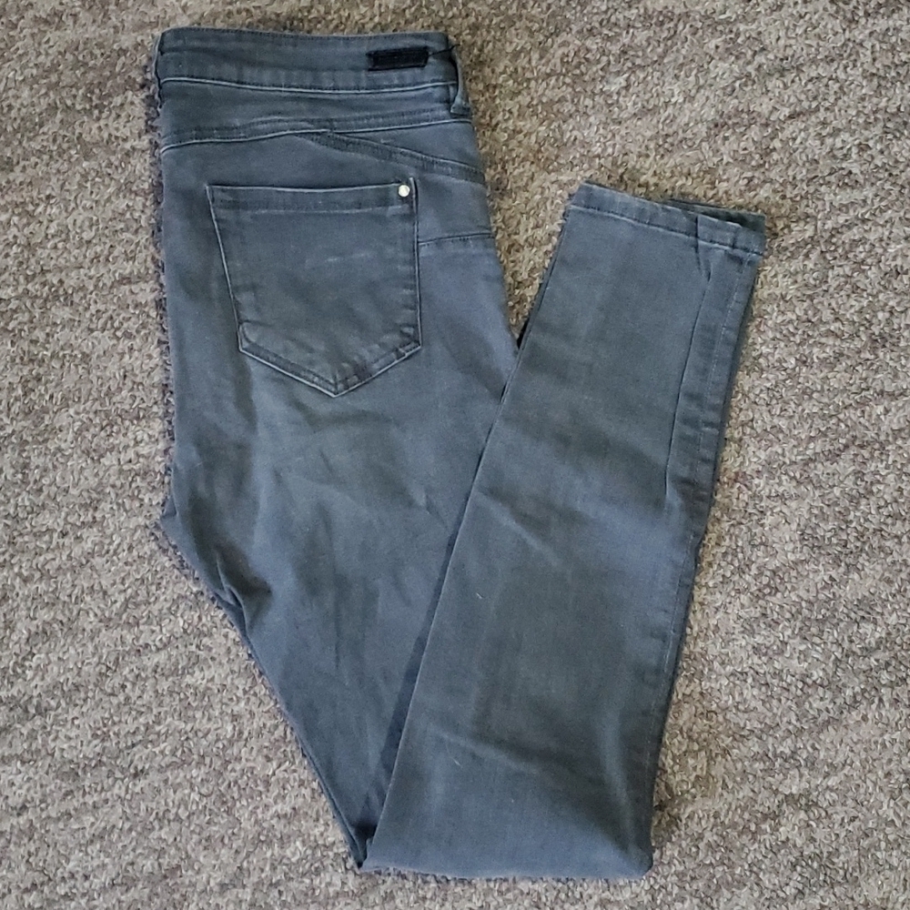 Eighty-two size 13 skinny jeans